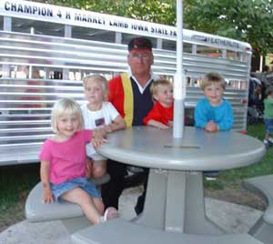 Family at a plastic table