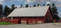 Side view of a red barn