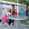 Family at a plastic table